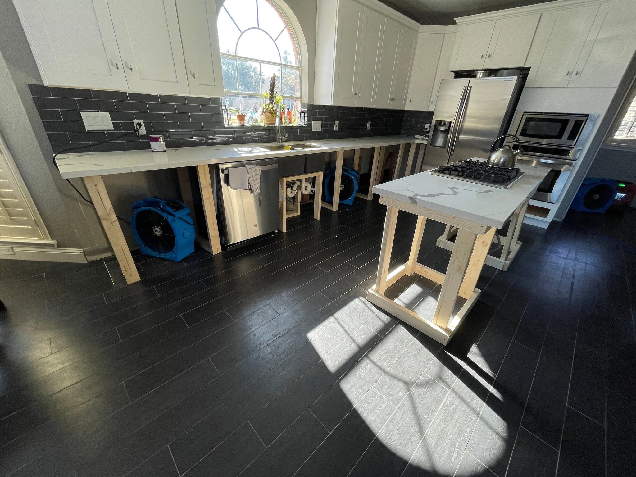 Water damage restoration project — before and after