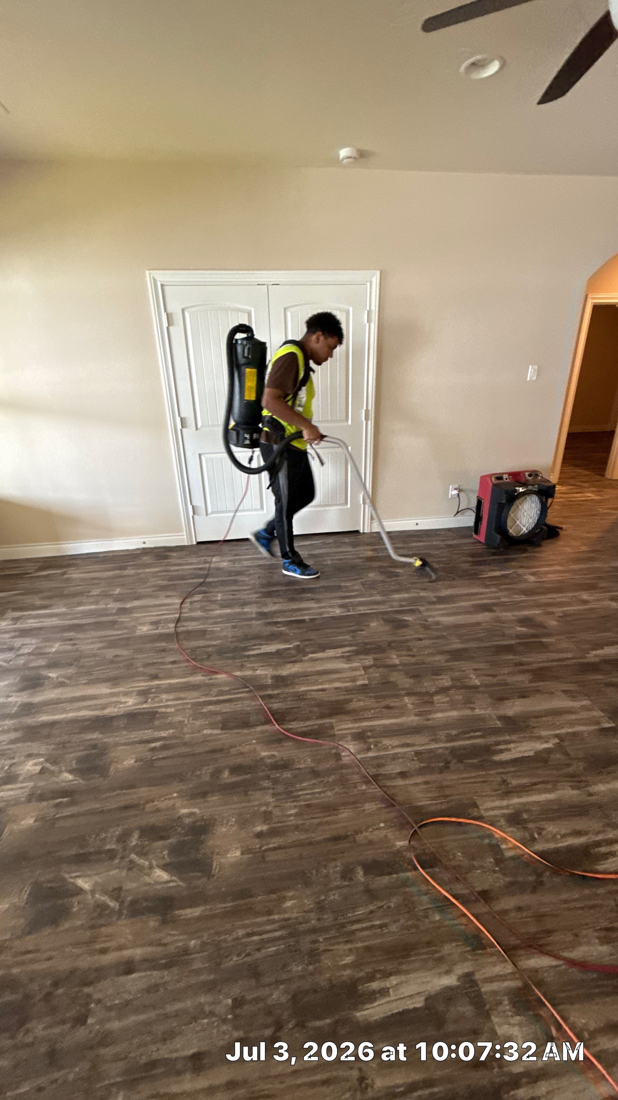 Butler CCS technician using air blower during indoor air quality service